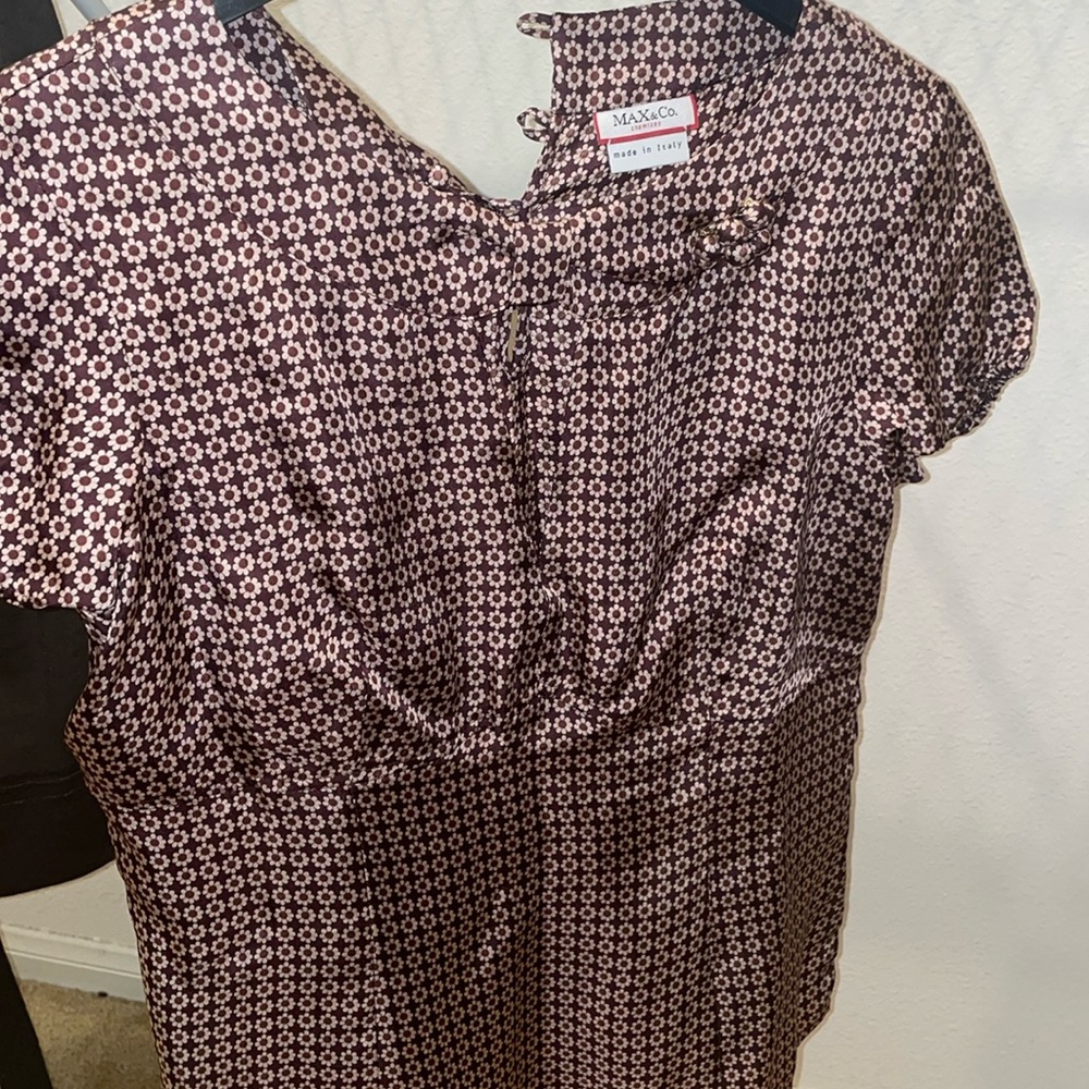 Beautiful blouse with opening in the front  and side zipper